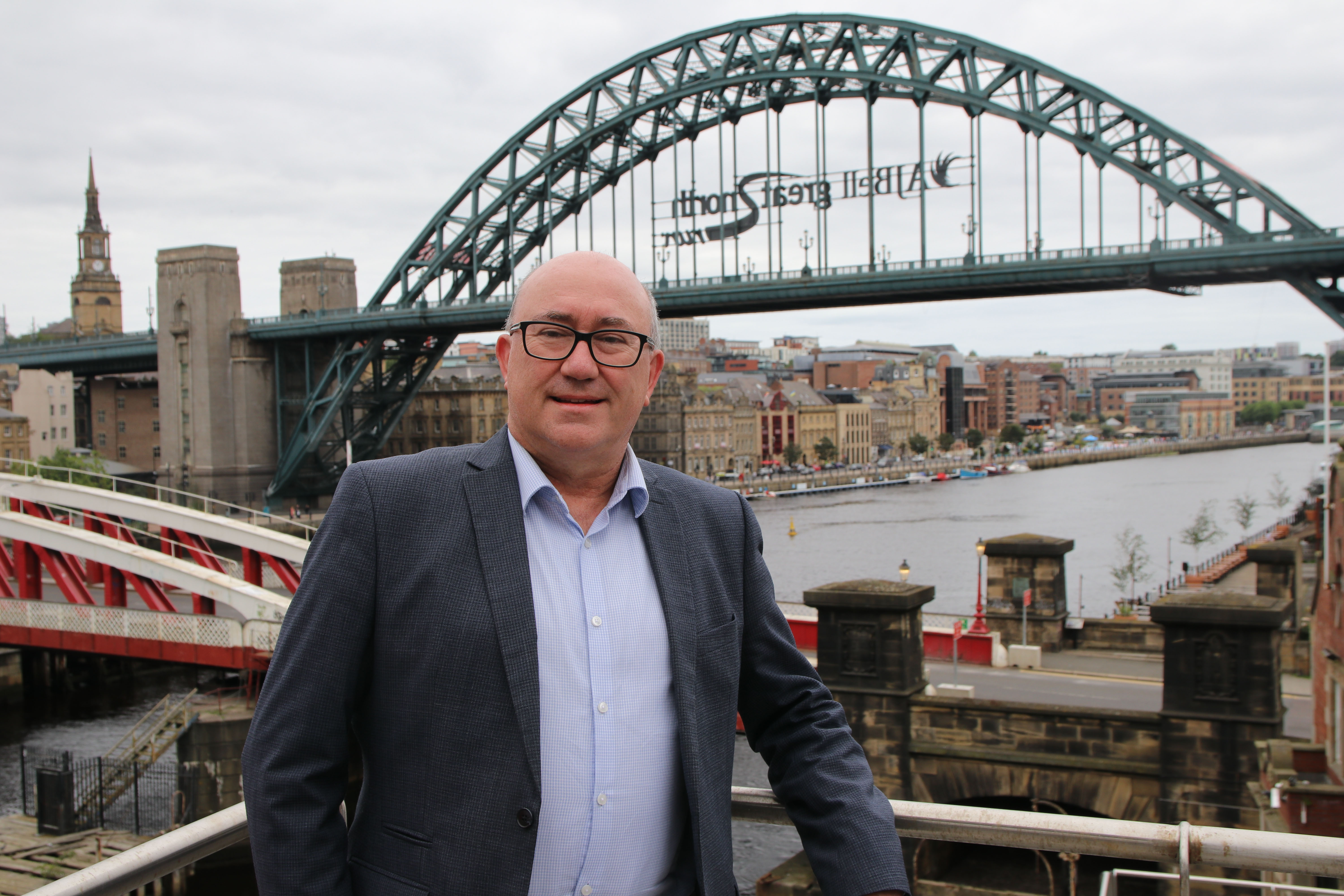 Steve Watson stood in front of Tyne Bridge