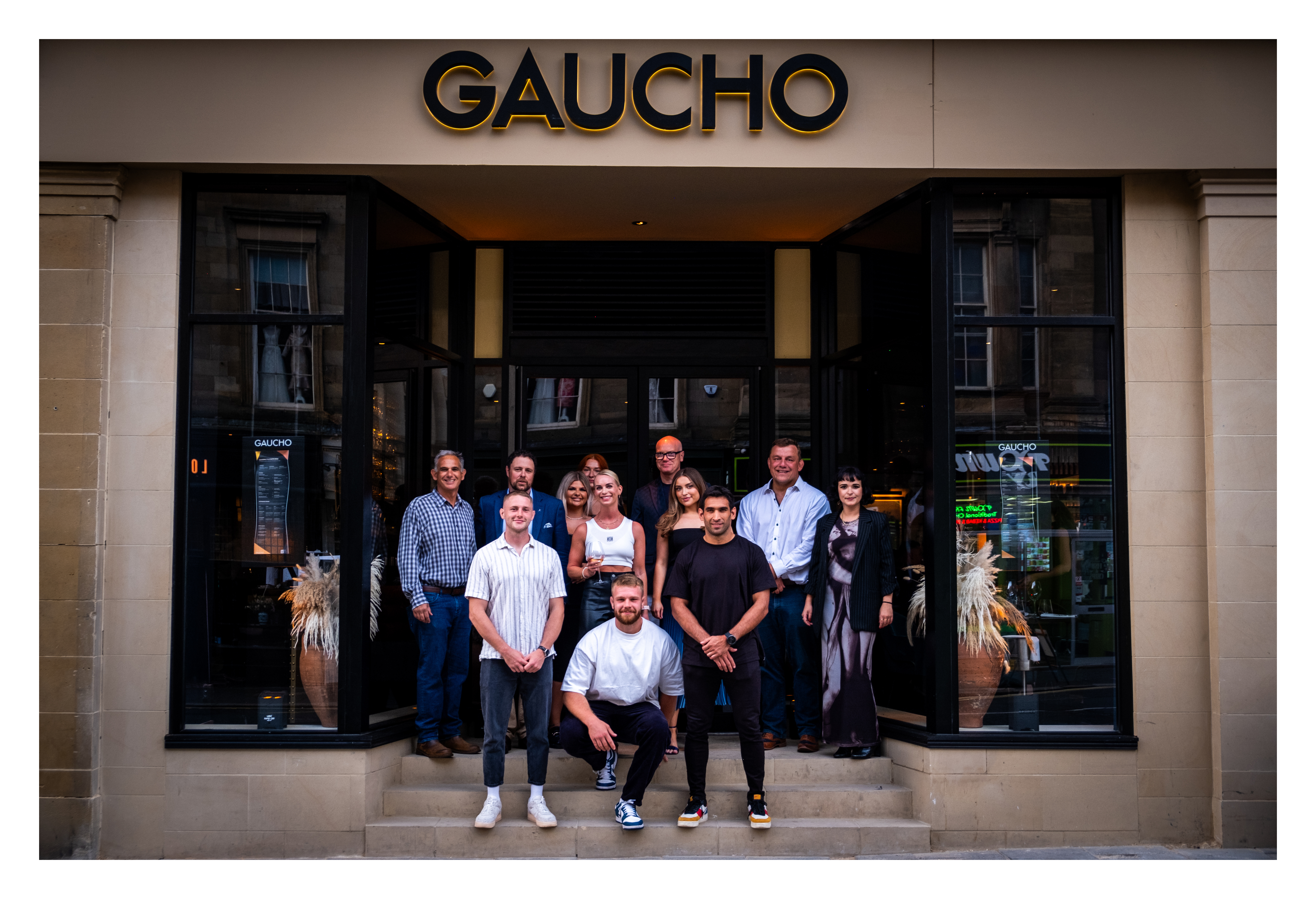 Newcastle Falcons team stood outside Gaucho entrance in Newcastle