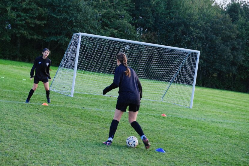 Two girls from Heaton Stannington Juniors playing football at Paddy Freeman’s Park.