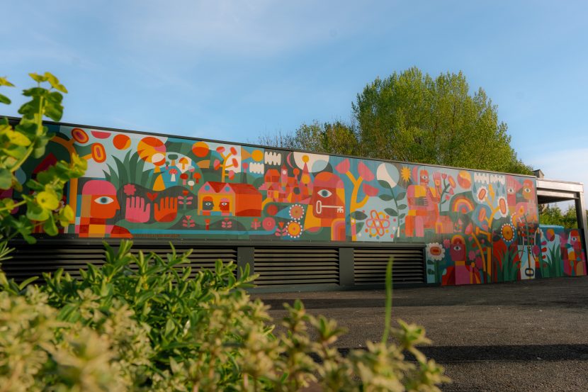 Image of mural on a sunny day on Pattern Shop energy centre.