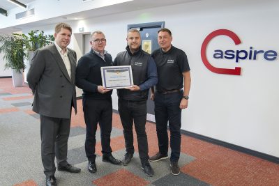 Image of Aspire team receiving award at their office