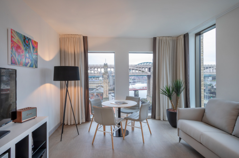 Image of interior of Innside room with Newcastle bridges in the view out of the window.