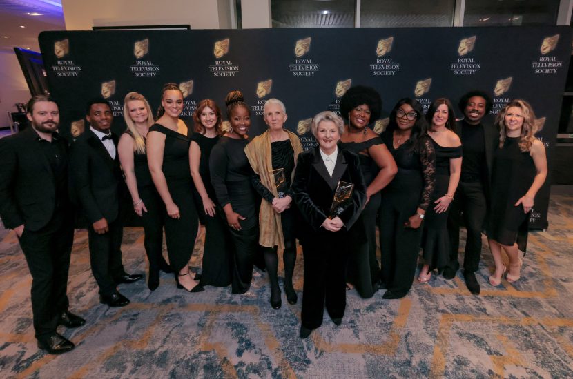 Large group of RTS Award winners posing in front of RTS Awards backdrop